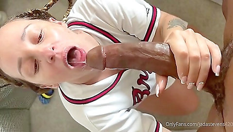 Ebony chick with a tattooed pussy gets a facial shot