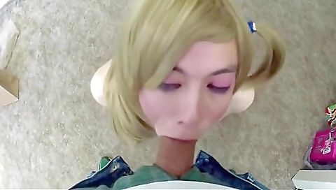 Blonde shemale giving a deepthroat blowjob to a guy