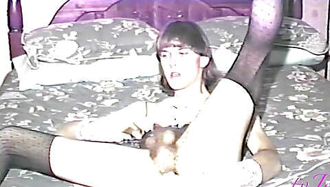 Busty brunette with sexy lingerie is playing with her hairy pussy