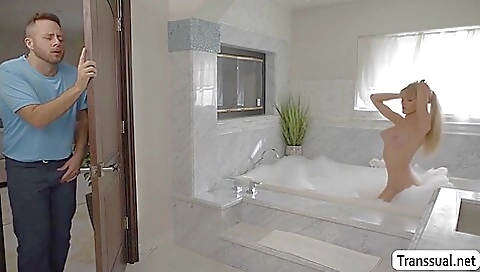 Blonde shemale with big tits gets his big dick in ass