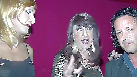 A tranny with big tits fucks a guy in an old manhood