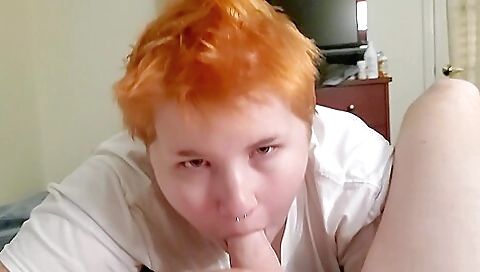 Busty red hair teen in a black dress and stockings