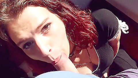 Redheaded babe with small tits wears lingerie and a tattoo